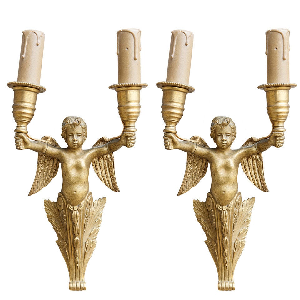 Pair of Gilt Bronze Sconces with Winged Cherubs