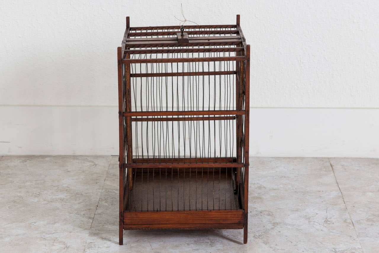 Antique wood and wire birdcage. Found near Paris.