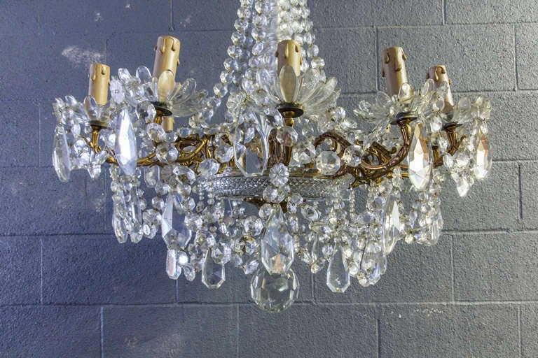 Large French crystal and bronze chandelier with twelve lights, mid-20th century.