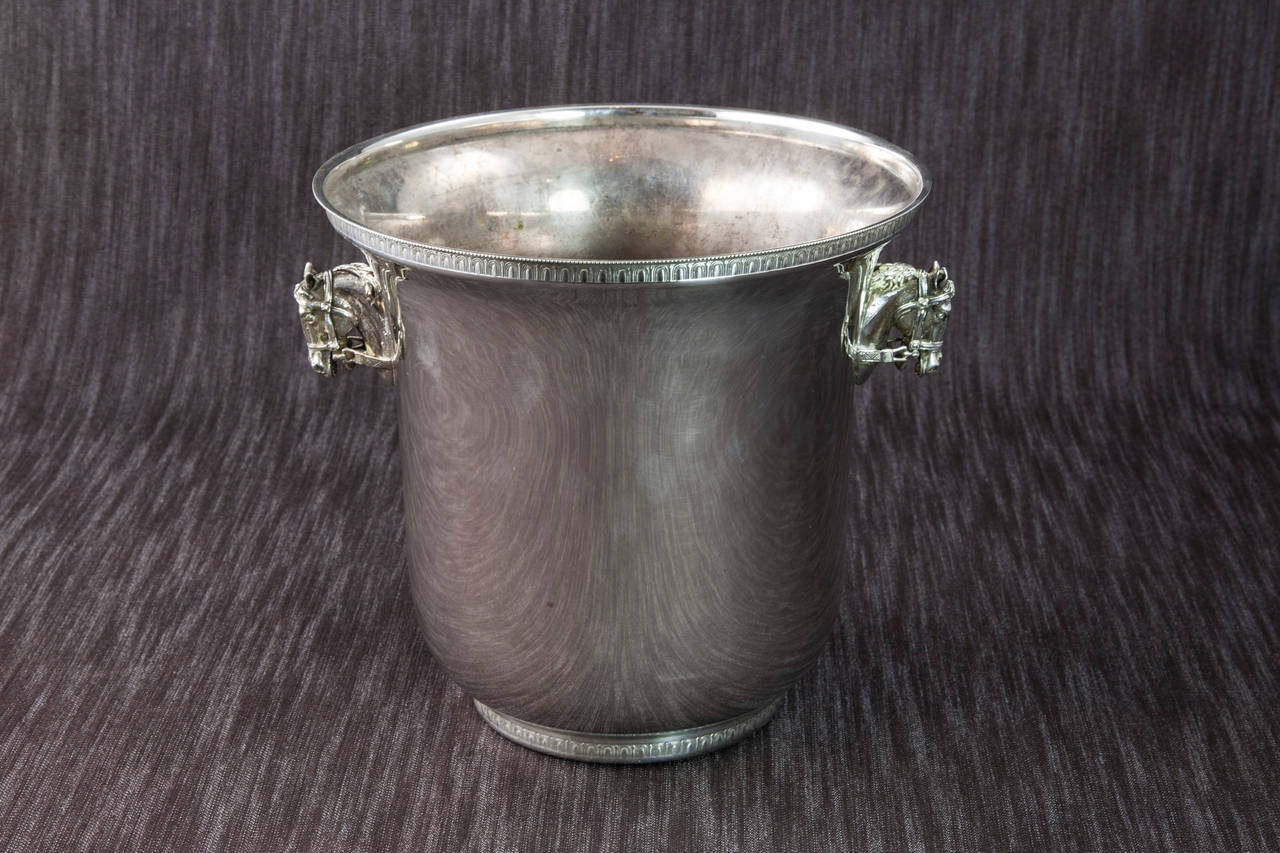 A perfect gift for the equestrian enthusiast in your life, this silver plate champagne bucket with horse head handles will serve beautifully in any space.