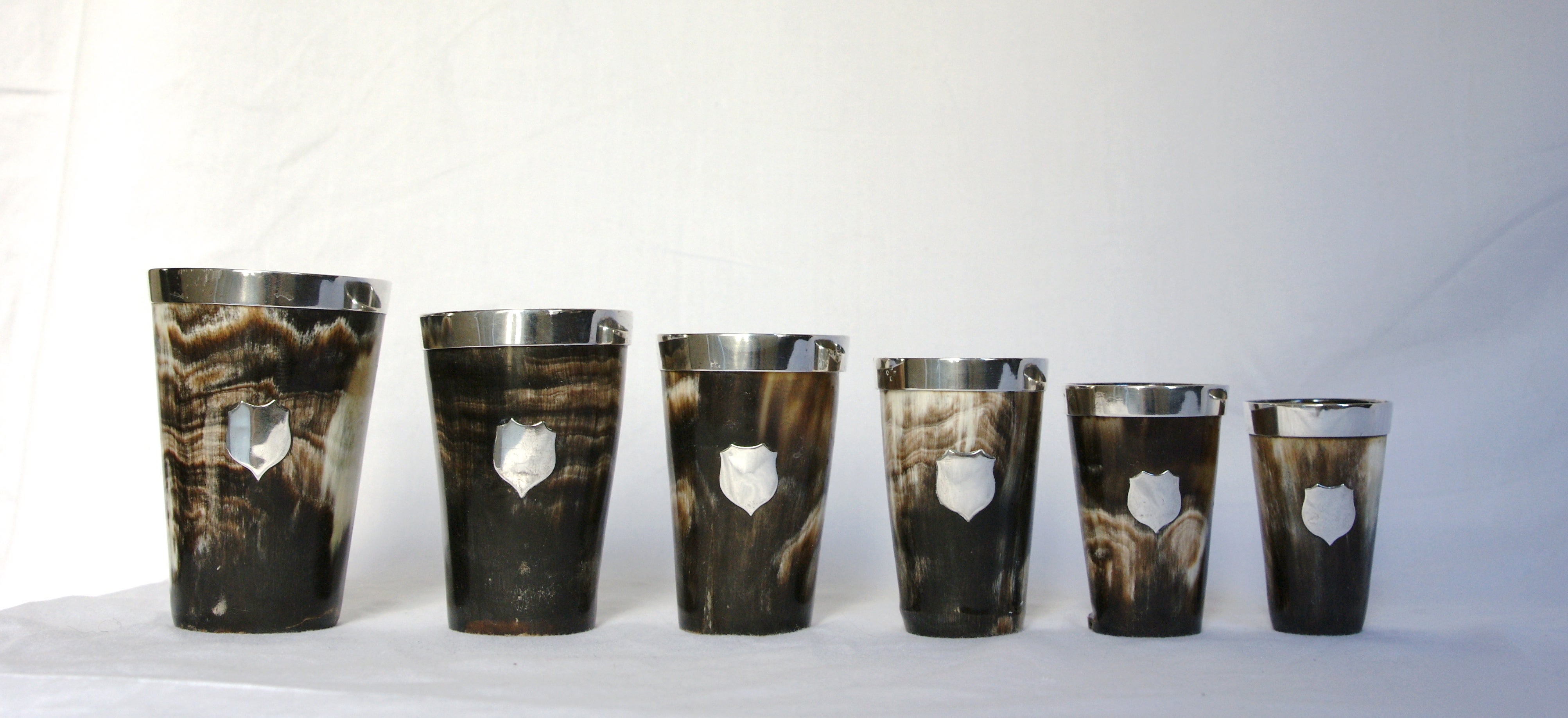 Set of Six Horn and Silver Beakers