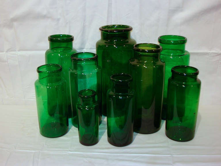 Price ranges from $95.00 to $125.00 per piece depending on size.  This stunning selection of green glass apothecary jars ranges in size from 2.5 inches in diameter x 6.75 inches high to 6 inches in diameter x 14 inches high. Although the jars are