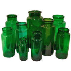 A Selection of Green Glass Apothecary Jars