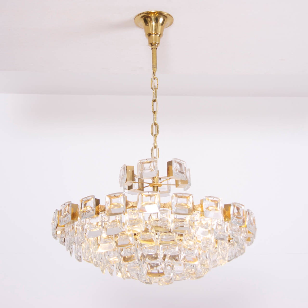Glamorous gilded brass and glass chandelier. Glass parts look like huge jewels. Fantastic quality and very good condition.
To be on the the safe side, the lamp should be checked locally by a specialist concerning local requirements.


