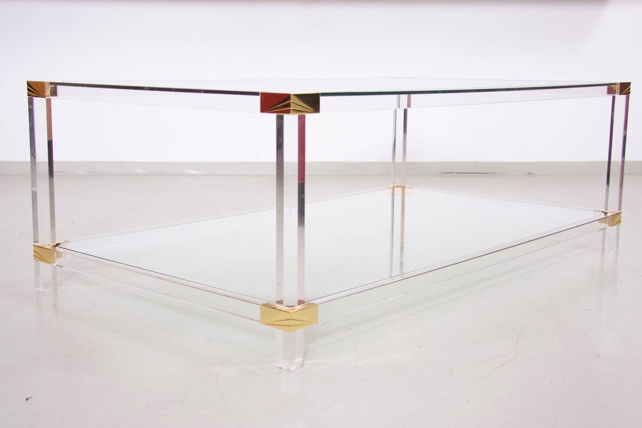 Hollywood Regency Two-Tier Lucite and Brass Coffee Table in the Style of Charles Hollis Jones