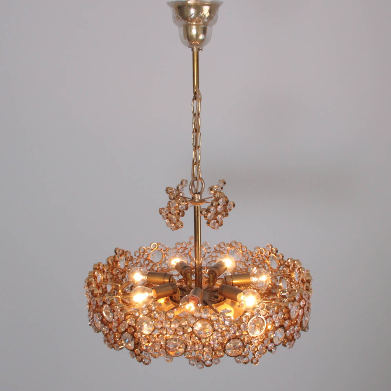 German One of Two Palwa Gilded Brass and Crystal Glass Encrusted Chandeliers For Sale