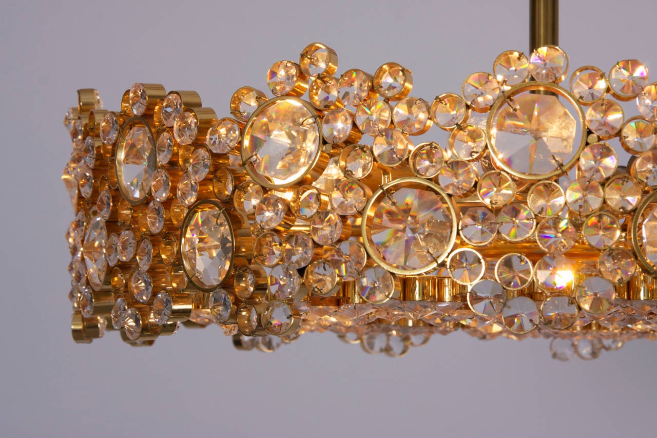 Mid-20th Century One of Two Palwa Gilded Brass and Crystal Glass Encrusted Chandeliers For Sale