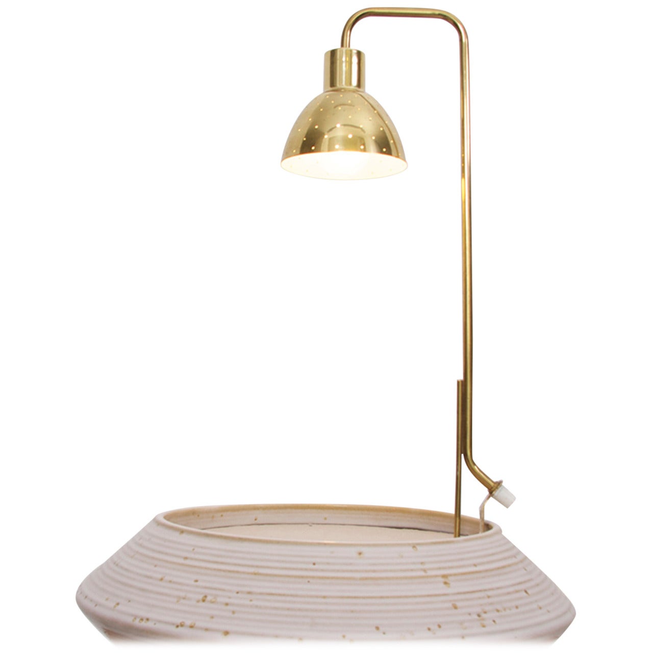 Planter lamp for Markaryd by Swedish designer Hans Agne Jakobsson to stick down on flower pot.
To be on the the safe side, the lamp should be checked locally by a specialist concerning local requirements.

 