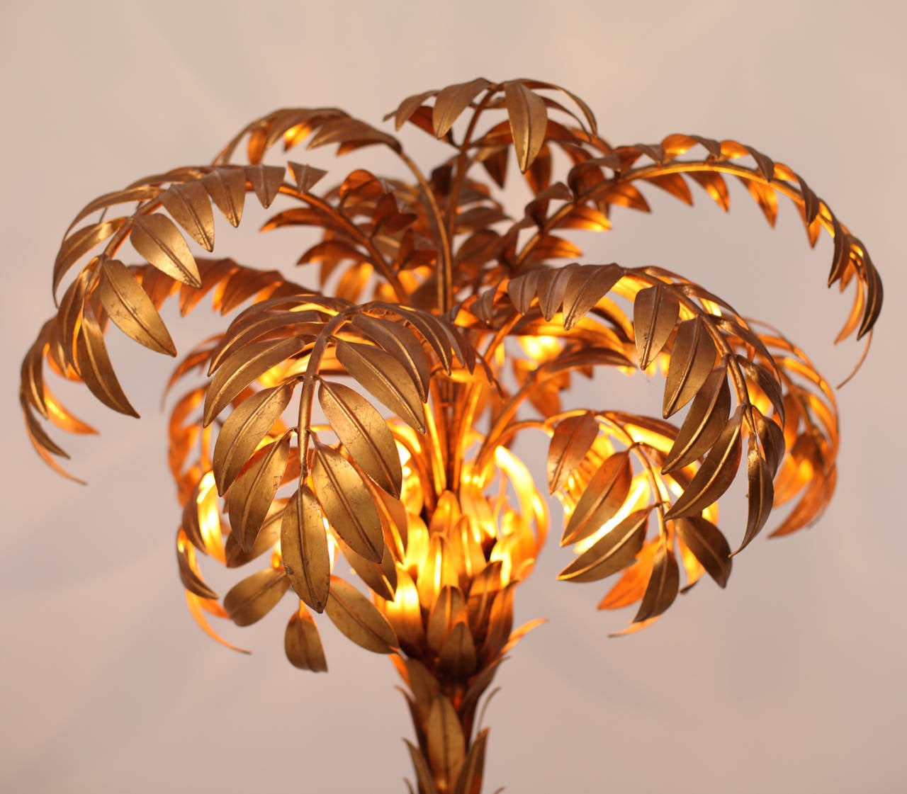 Huge pair of palm tree lamps from the 1970s of the German designer Hans Kögl. The lamps are metal-plated  and cast significant light shadows for a fantastic atmosphere. 3 x E27.