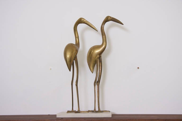 A very decorative pair of cranes screwed on marble base. Nice patina!
The measures concern the base. The total hight is 55cm/21.65