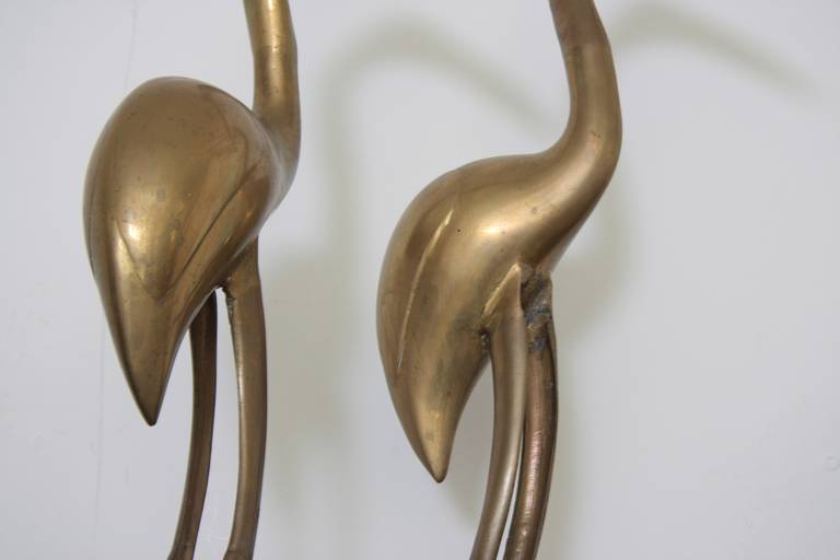 brass cranes sculptures