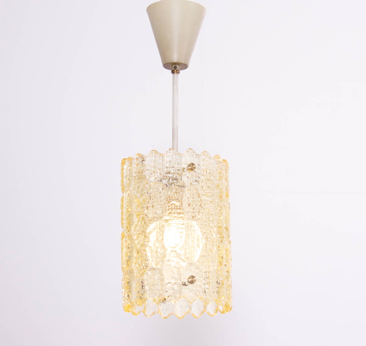 Two pieces of pressed yellowish glass, that lamp was designed by Carl Fagerlund for Orrefors. Height shown includes rod and canopy.
To be on the the safe side, the lamp should be checked locally by a specialist concerning local requirements.
