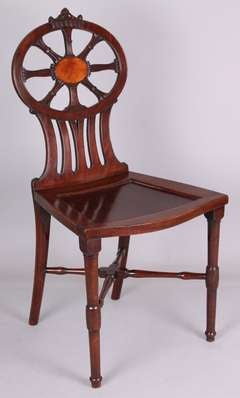 Fine and unusual George III period mahogany 'medallion-back' hall chair