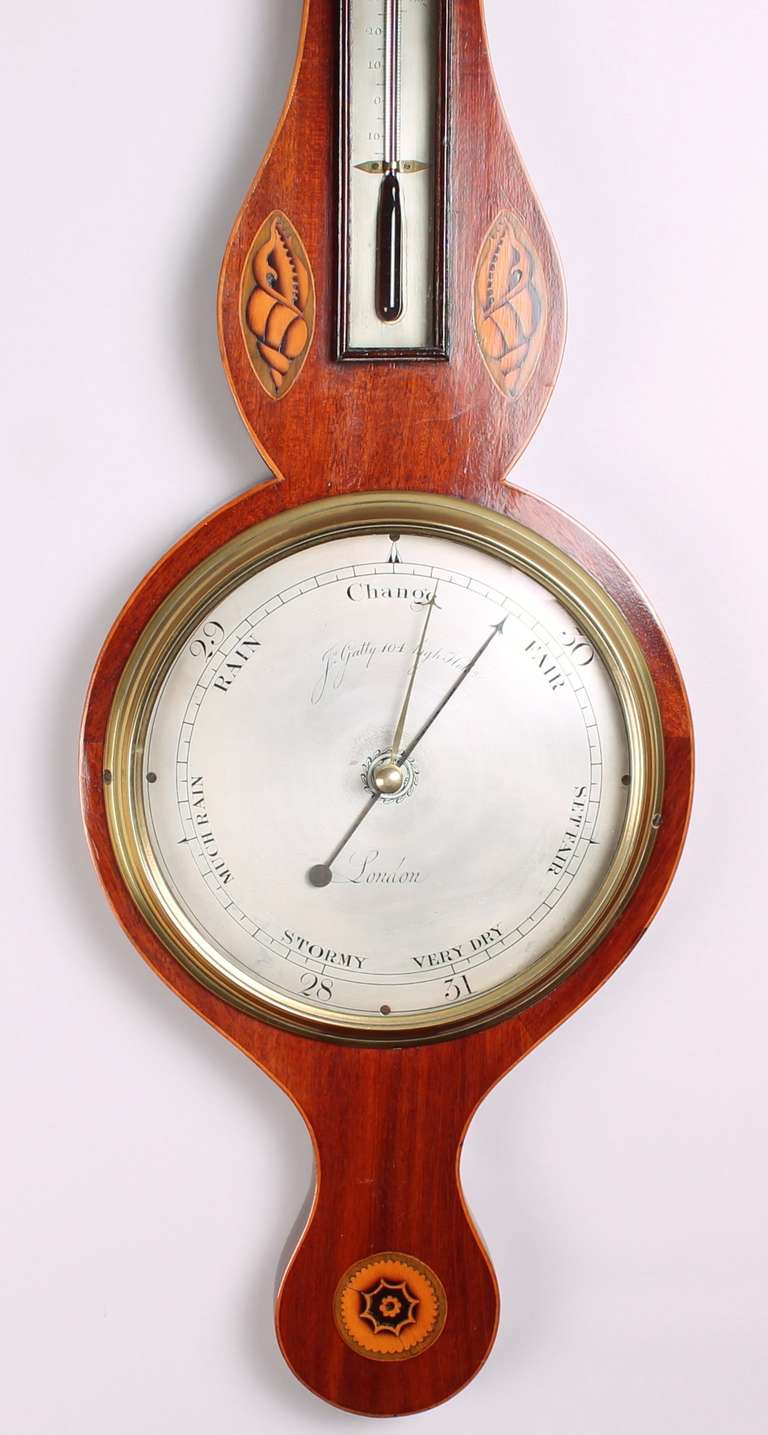 Early 19th century mahogany wheel barometer by J. Gatty, 104 High Holborn, London; the 8