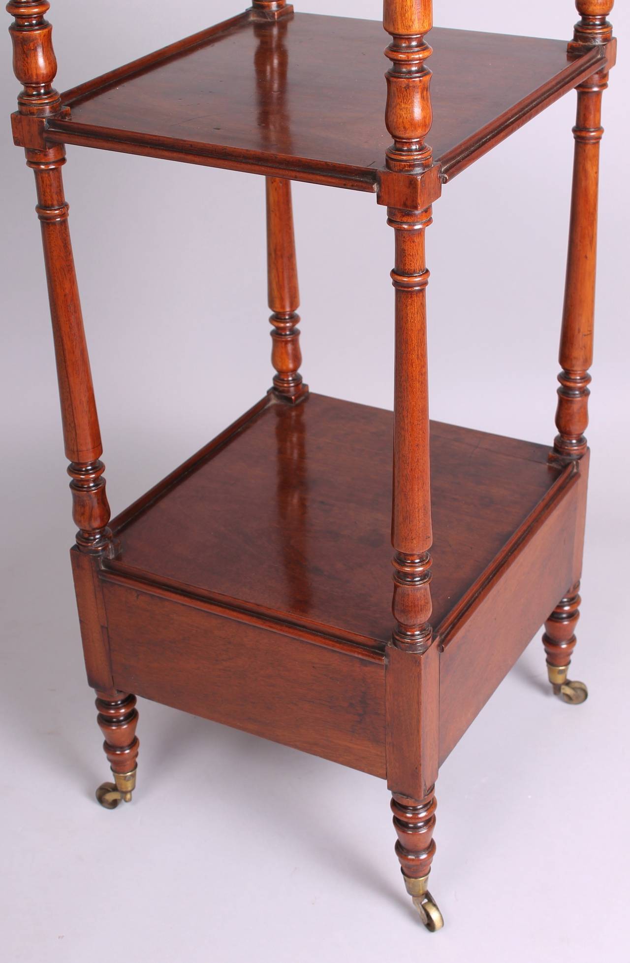 A late George III period mahogany small whatnot 1
