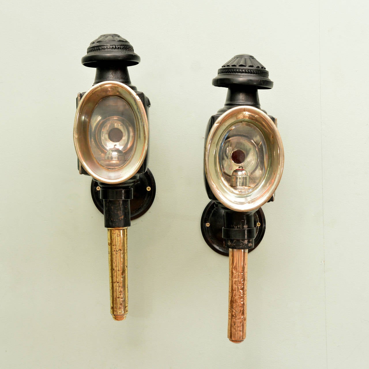 A pair of carriage lanterns by F. W, Constable, coach and carriage builders of Cirencester and Fairford, circa 1900.  Painted tin and nickel plated copper.  

Available to view at Brunswick House.
