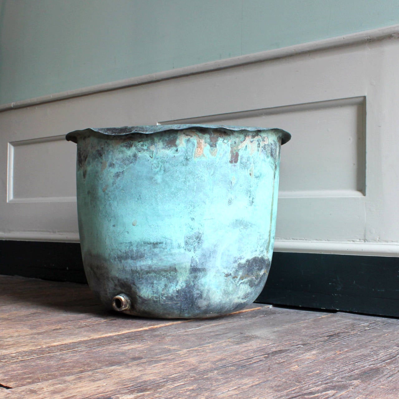 A nineteenth century copper, with outlet at base, excellent verdigris patination.

Available to view at Brunswick House, London.

Diameter 55cm, height 48cm.