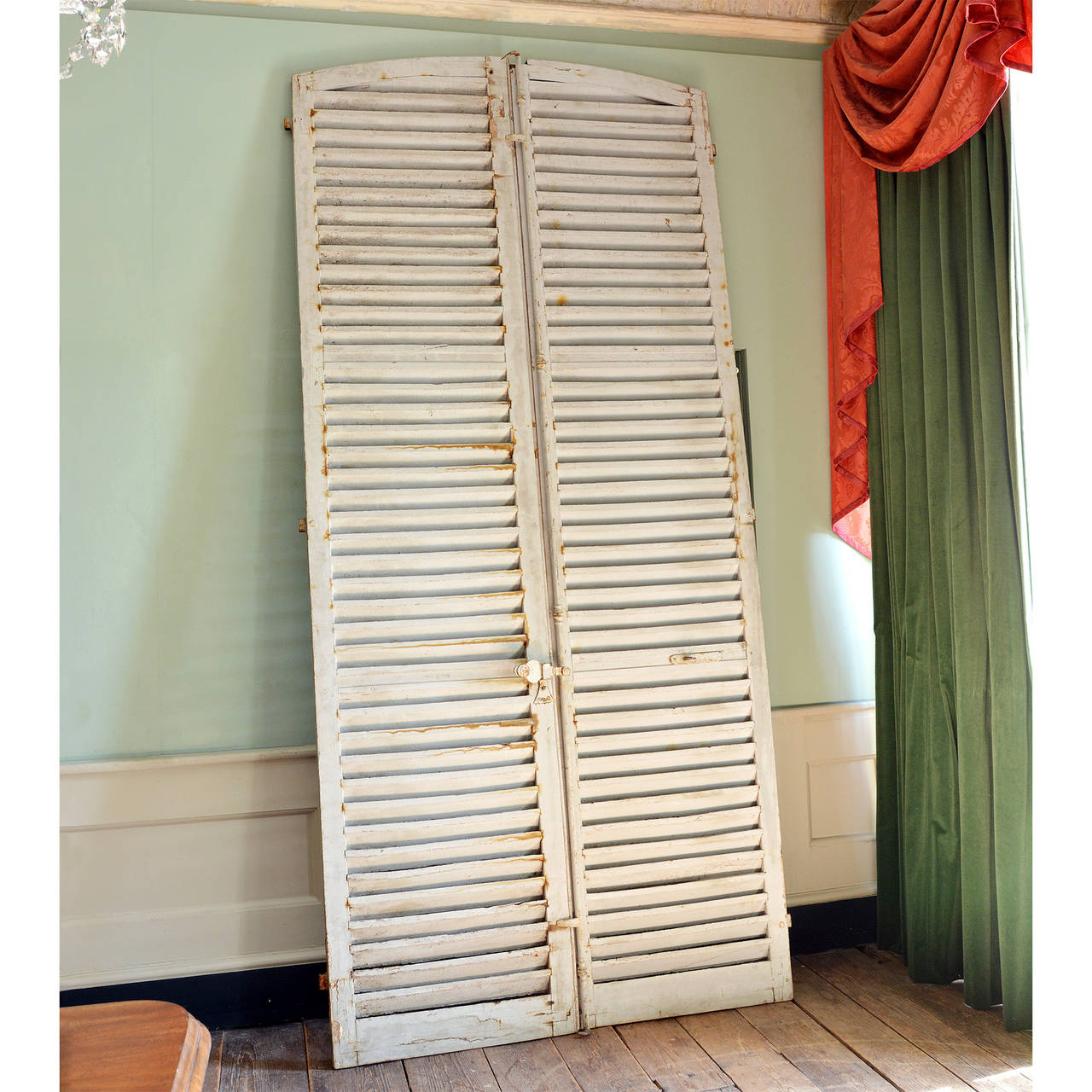 A pair of late nineteenth/early twentieth century French louvred window shutters, in old white paint.

Available to view at Brunswick House, London.

Listing is for one pair, but two pairs are available

289cm high, 132.5cm wide.