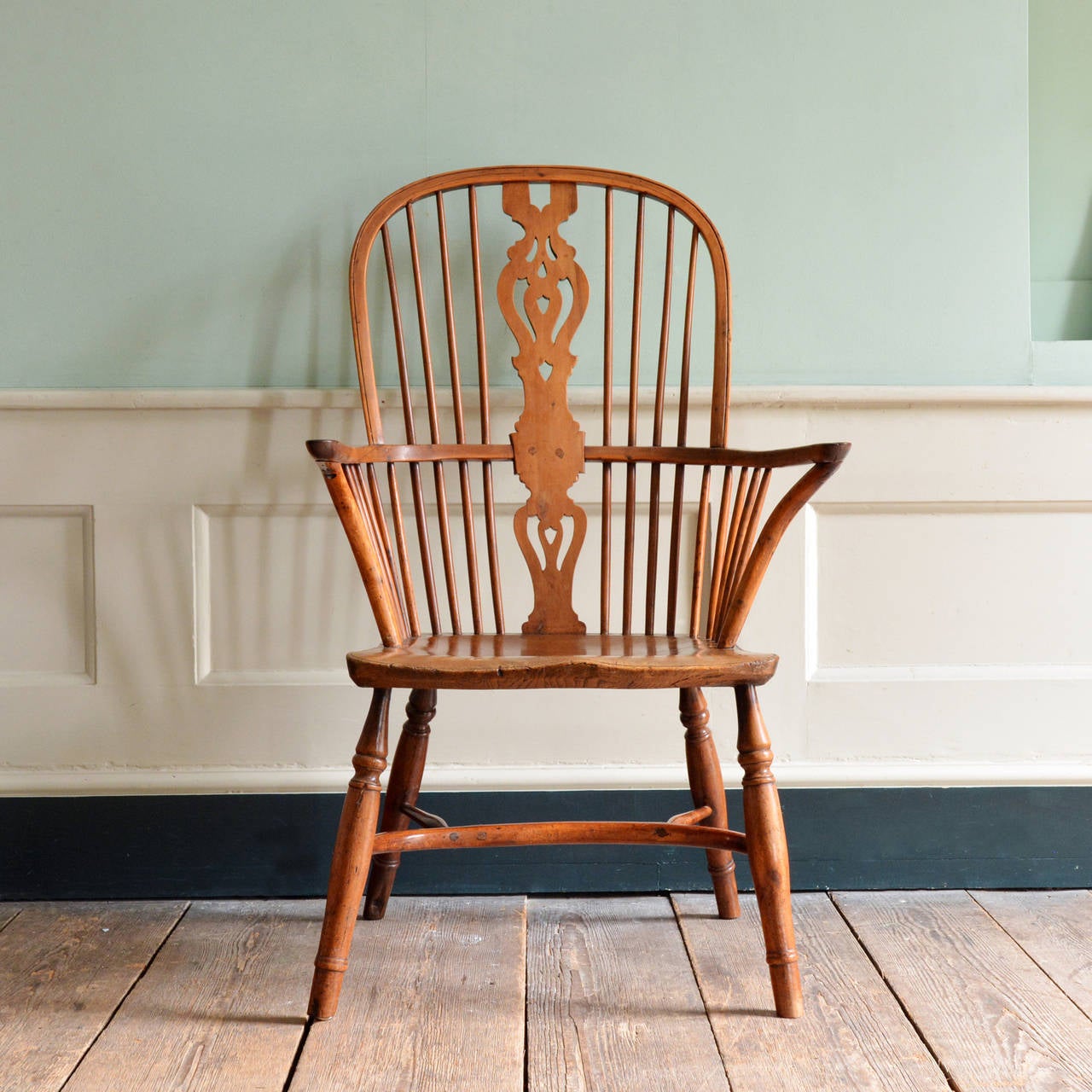 A large nineteenth century Windsor armchair, Thames Valley region circa 1830, yew with elm seat.

Available to view at Brunswick House, London.

Height 112cm, width 69cm, depth 51cm.