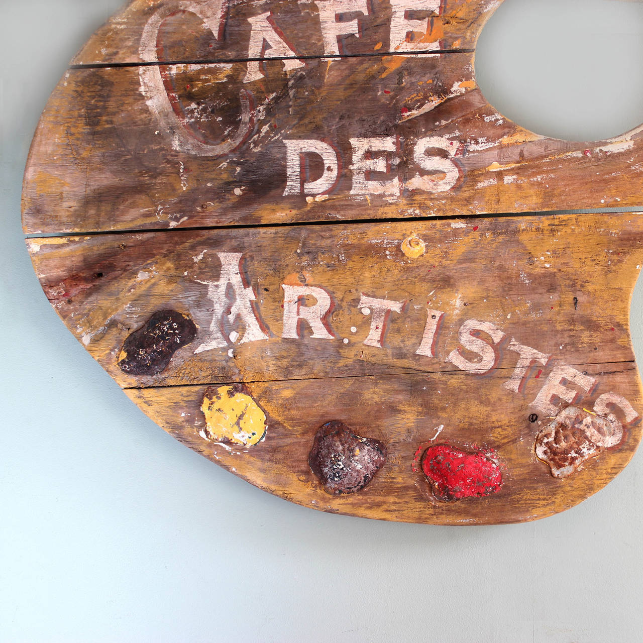 A French Cafe signboard, painted on pinewood, early twentieth century,

Available to view at Brunswick House, London.

80cm high, 87cm wide, 3cm deep.