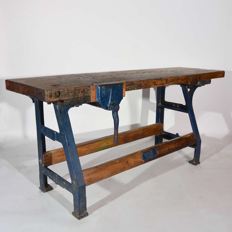 A Victorian cast iron sycamore and pine workbench, fitted with vice, stamped 'T. J. Syer, Finsbury, London', with diamond registration mark dating to 7th October 1881.