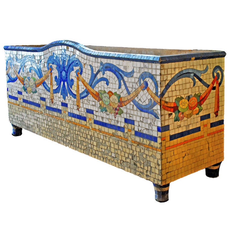 A large polychromatic tiled planter, Catalonia, early twentieth century.

Available to view at Brunswick House, London.