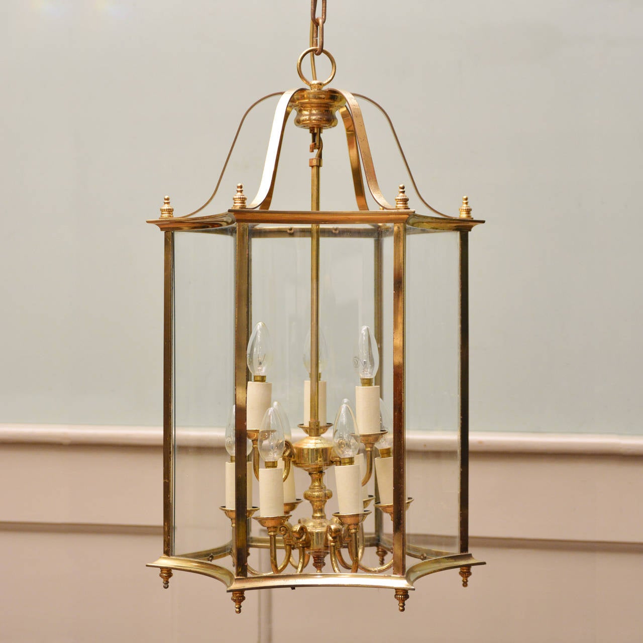 A large brass hall lantern, of shaped hexagonal form, with nine light suspended fitting.

Available to view at Brunswick House, London.

Height 73cm, width 46cm.