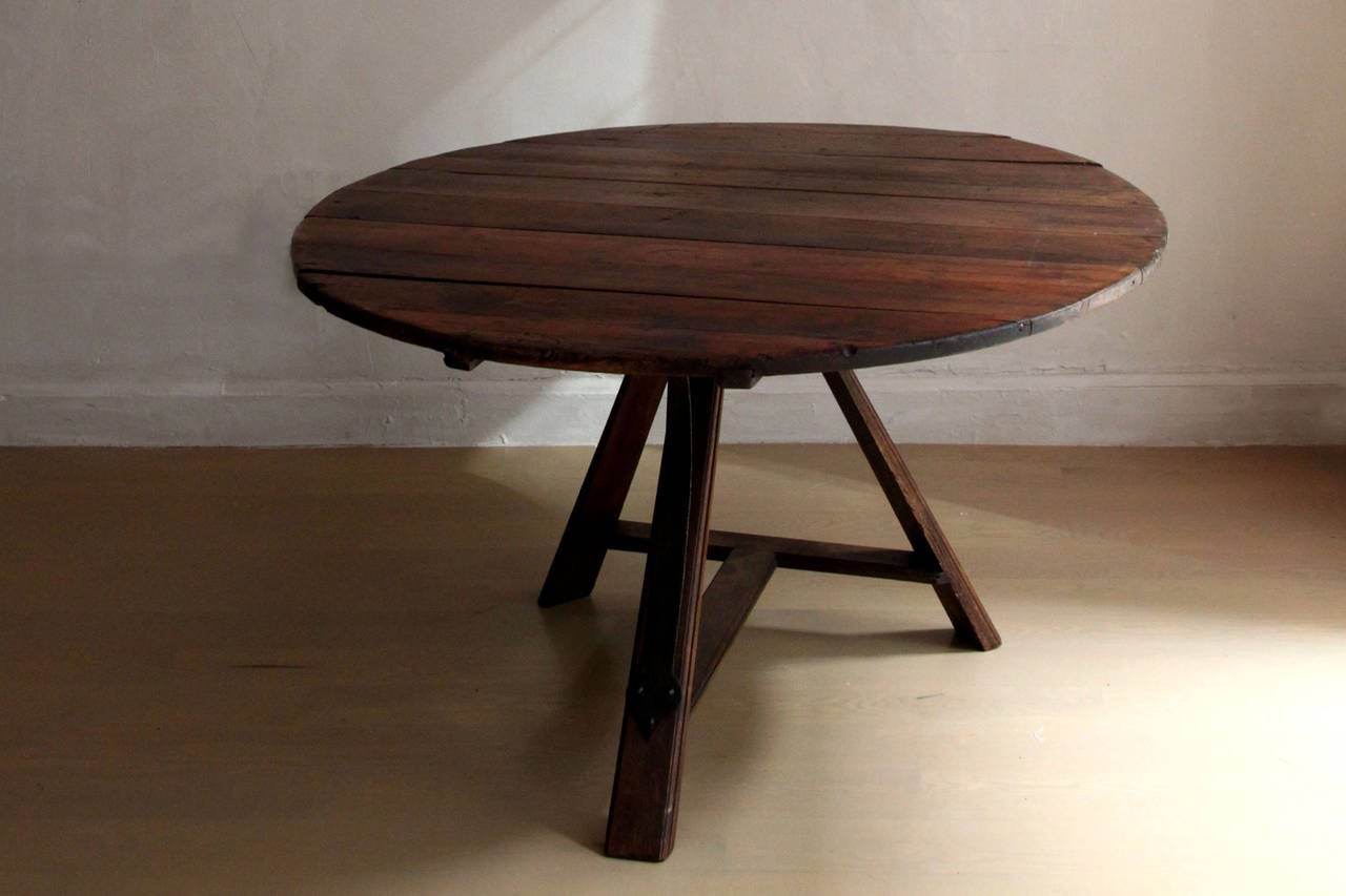Early 19th century Dutch table with a 5 plank top in Oak and Pine.
