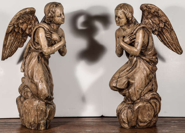 Pair of late 18th century, or early 19th century, carved wooden angels.