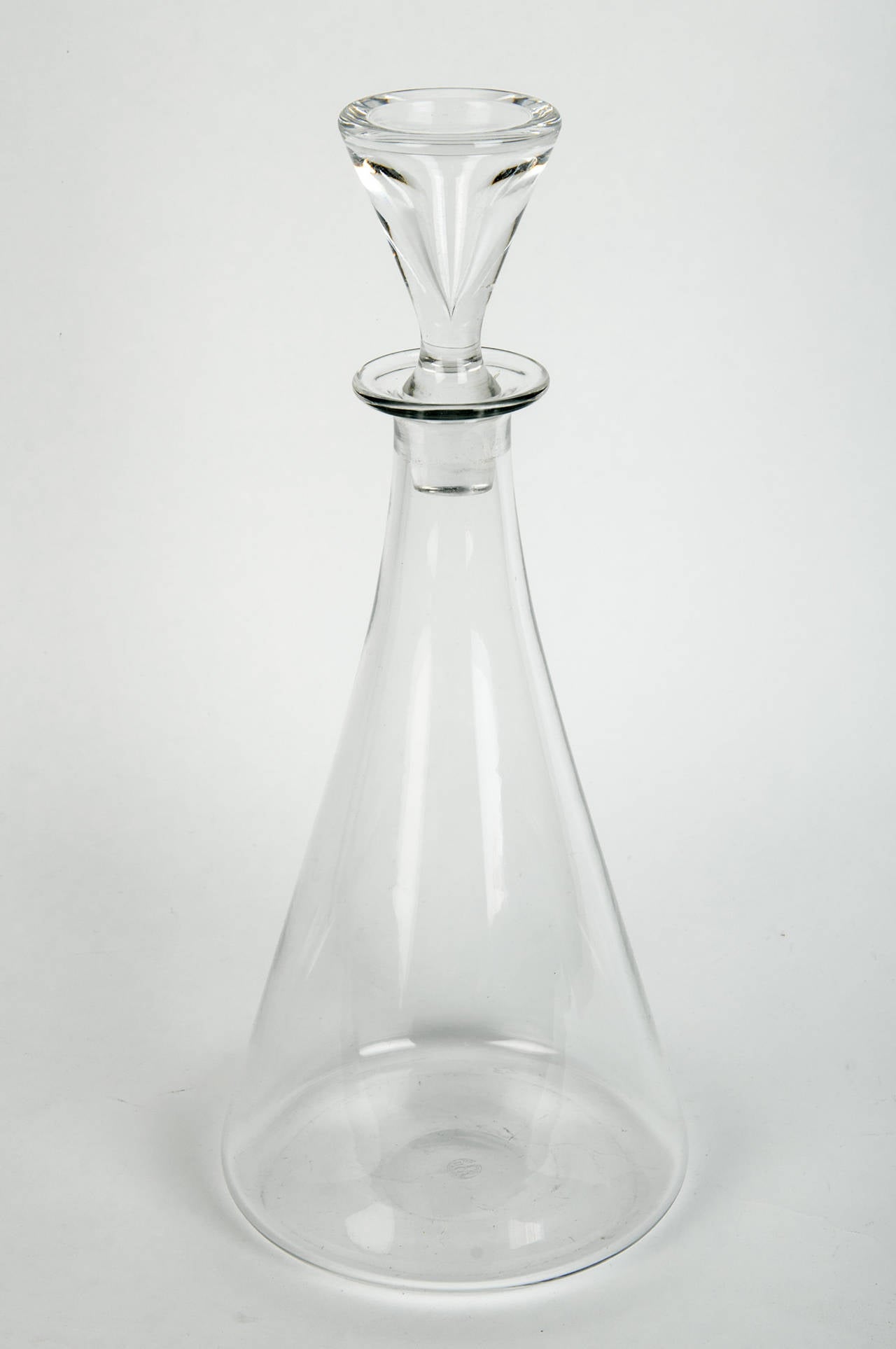 A vintage crystal stamped Baccarat decanter with cut crystal lid.