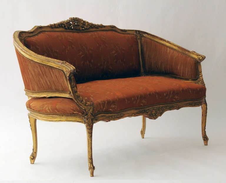 Antique Louise XVI Settee with gilded wood frame.