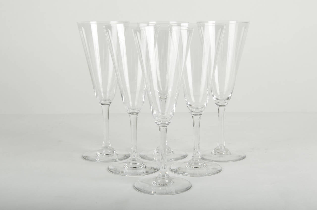 A vintage set of six stamped Baccarat champagne flute. Excellent condition.