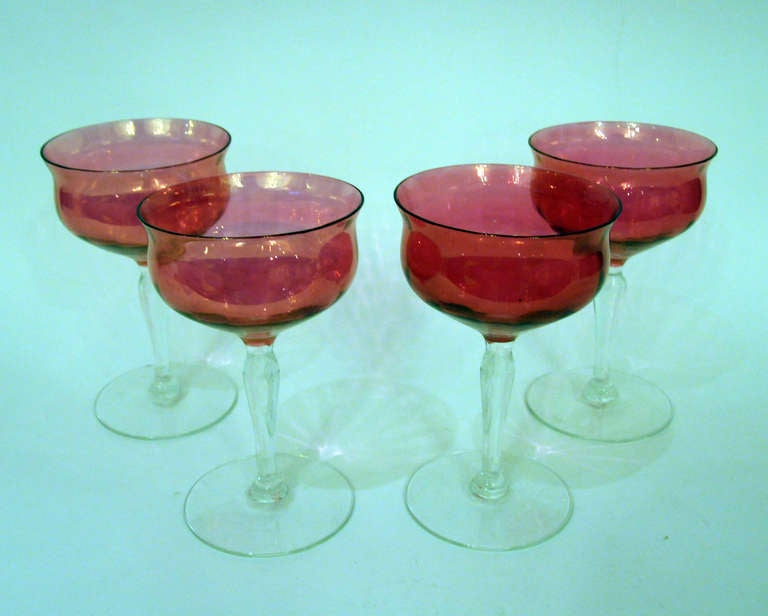 Set of 4 vintage champagne coups.  Cranberry colored opalescent glass.