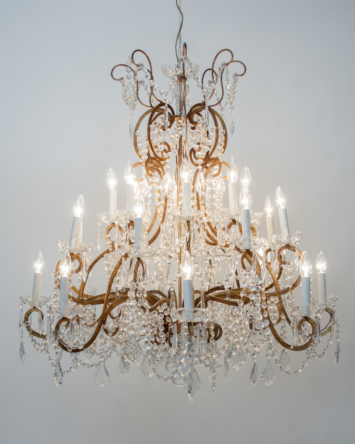 Vintage French crystal chandelier. Nineteen lights/arms. Excellent working condition. Recently rewired. Normal standard lights bulb.