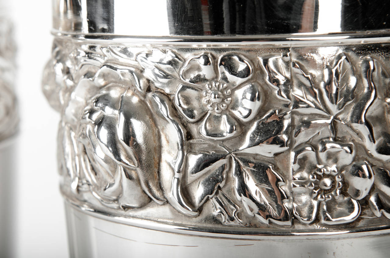 Antique pair of English vase with floral design chased band, circa 1885. Silver plate. Great condition. The vases measure 14