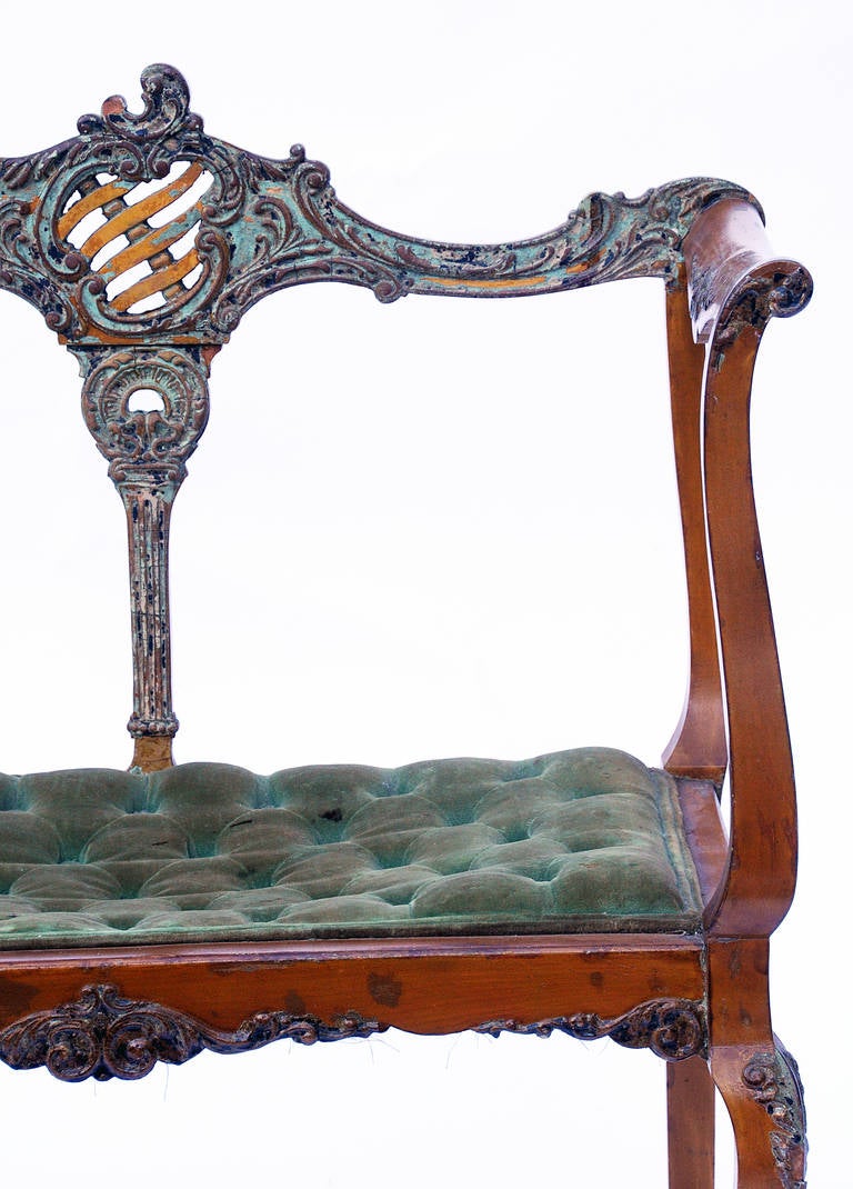 An interesting chair with carved details and tufted seat.  New upholstered seat is recommended.