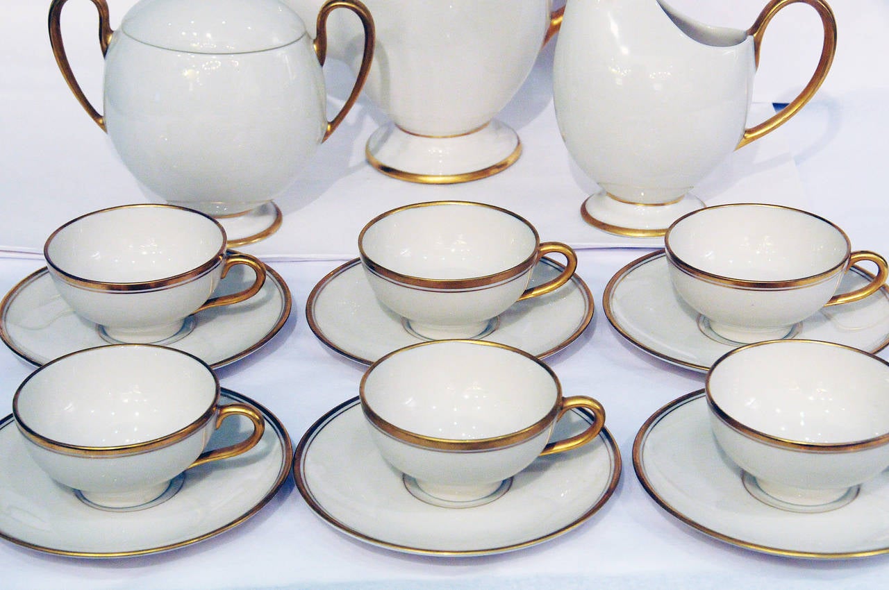 Vintage Californian Deco porcealin tea or coffee set with gold handles and trim.  Service for 6. Stamped 