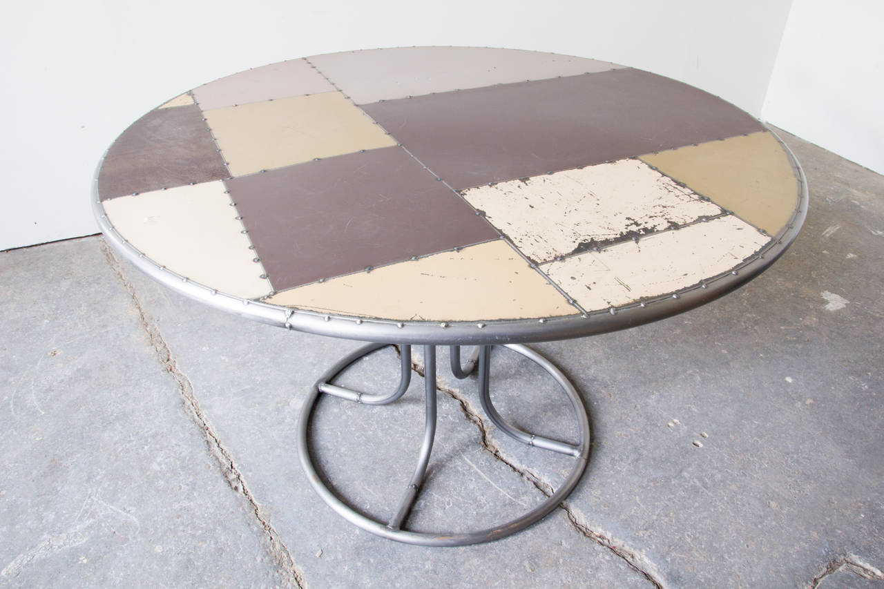 Industrial Scrap Metal Pedestal Dining Table