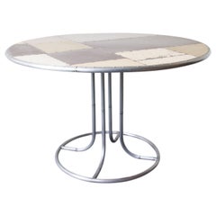 Scrap Metal Pedestal Dining Table