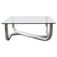 Mesa baja tubular cromada y de cristal
