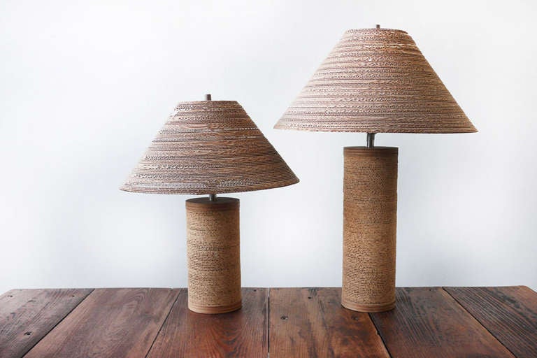 A set of mid-century cardboard lamps designed by Gregory van Pelt  for Raymor in 1977. 
Set: 20