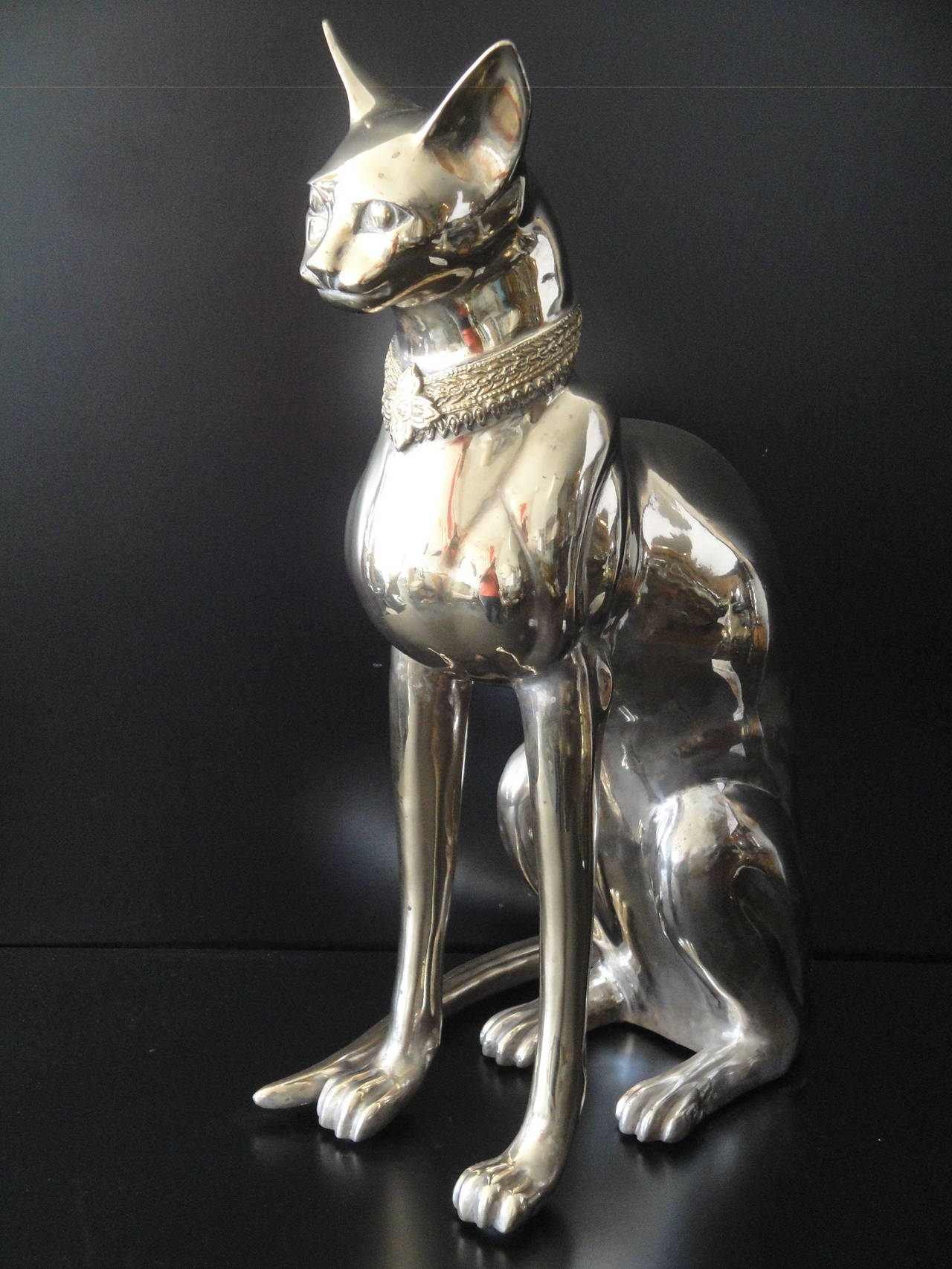 brass cat statue