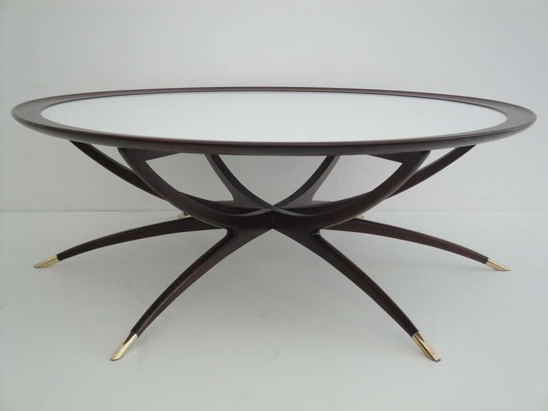 Mid century modern Spider leg coffee table with white glass top and brass feet
