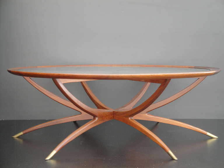 Mid-Century Modern spider leg teak and clear glass coffee table.