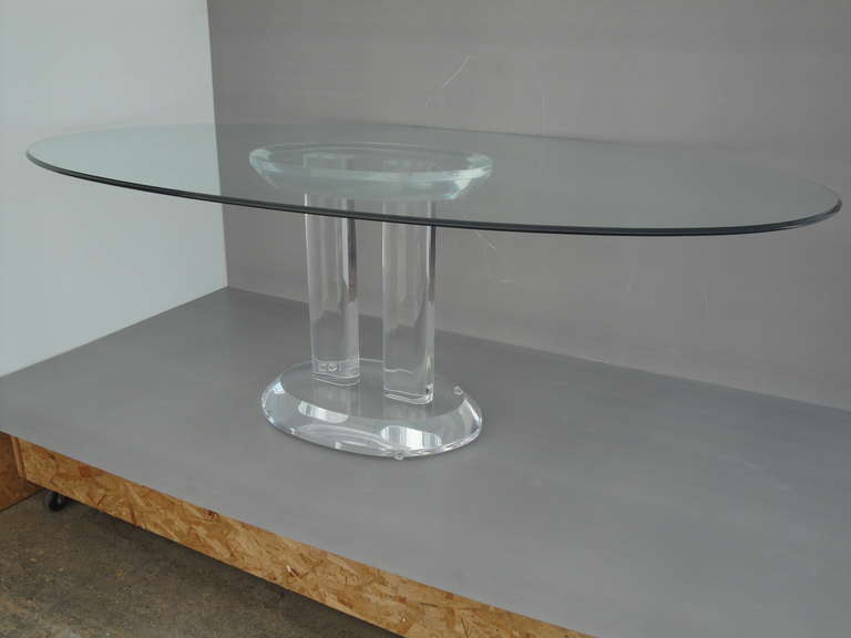 Signed,dated and numbered Charles Hollis Jones lucite dining table. 
Oval shaped base is made of 3