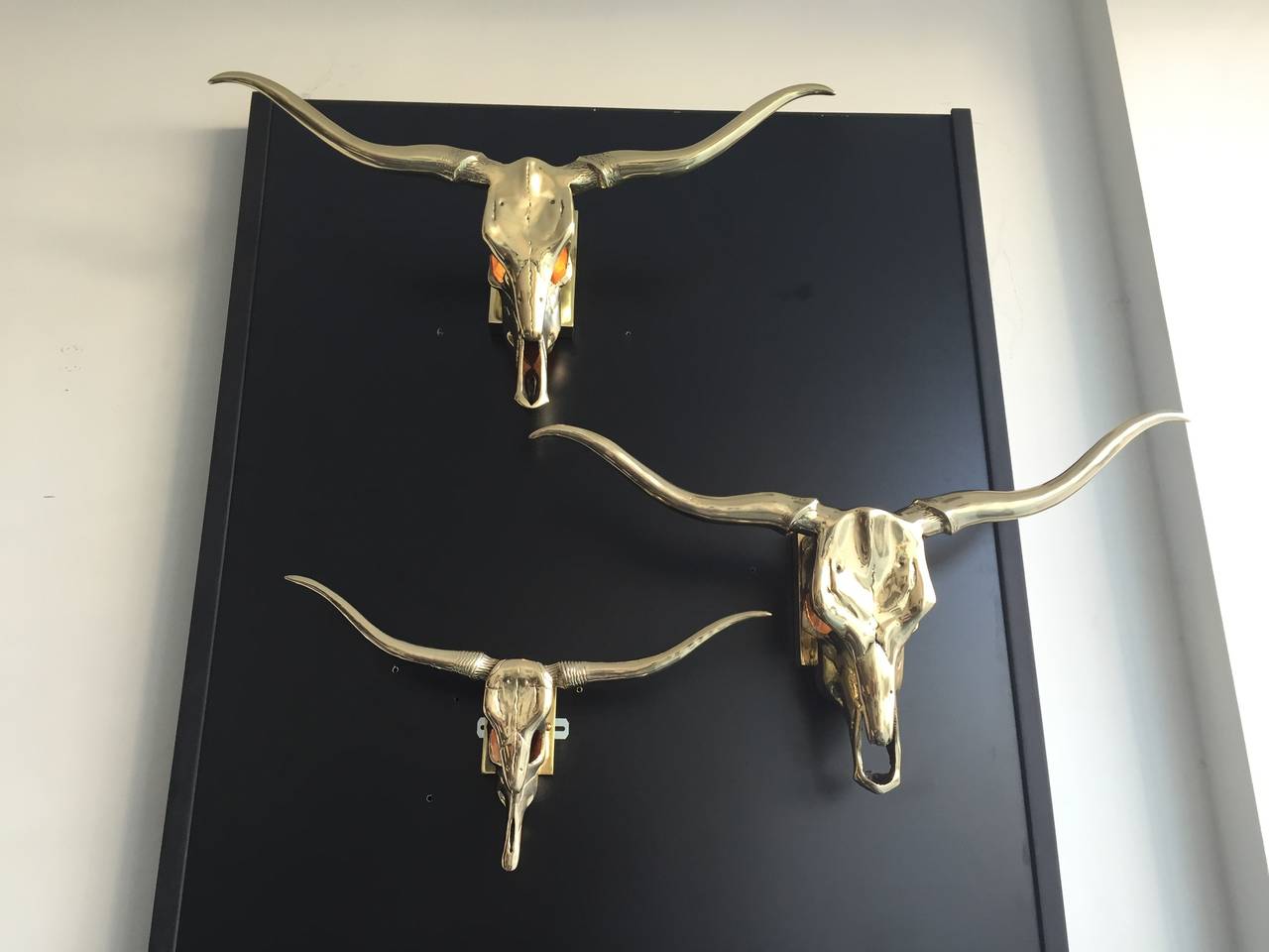 Hollywood Regency Collection of Five Polished Brass Longhorn Skulls Mounted as Lamps