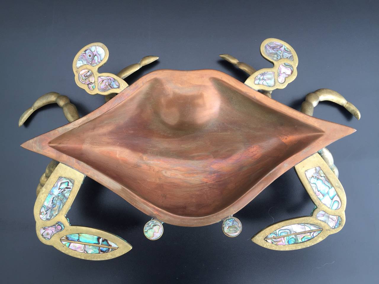 Brass copper and abalone crab family attributed to Los Castillos.
Small crabs are 9
