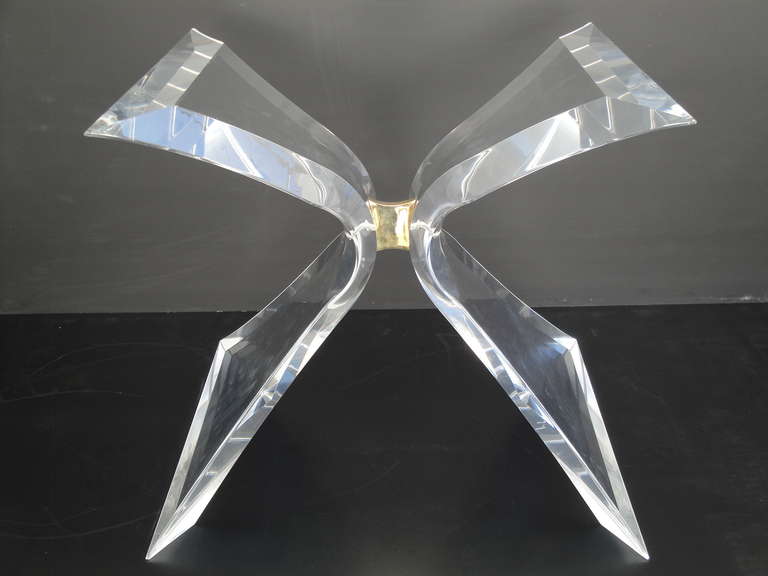 Lion in frost Lucite butterfly dining table base with plated brass connector. This item is located in Miami FL area