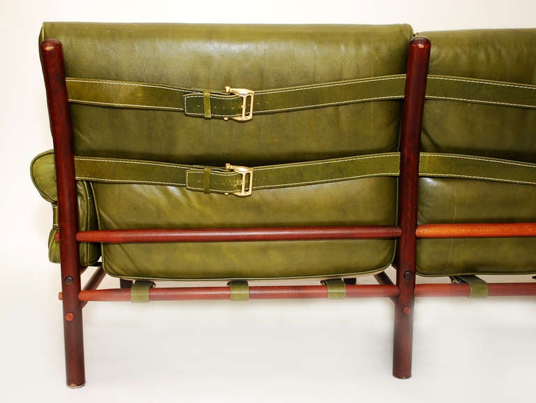 olive coloured sofa