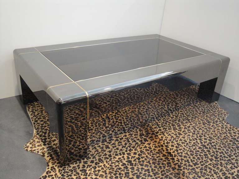 Karl Springer rare gunmetal finish and brass coffee table with original bronze colored glass.